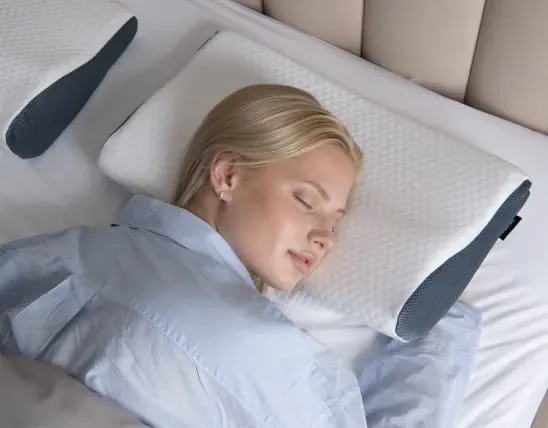 Side sleeping position context with a contoured pillow
